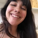 A rear close-up of a very cute girl's ass as a short hang drops, then she pulls a tampon. Brief clip. Filmed from a between the legs perspective. Vertical format video. About a minute.